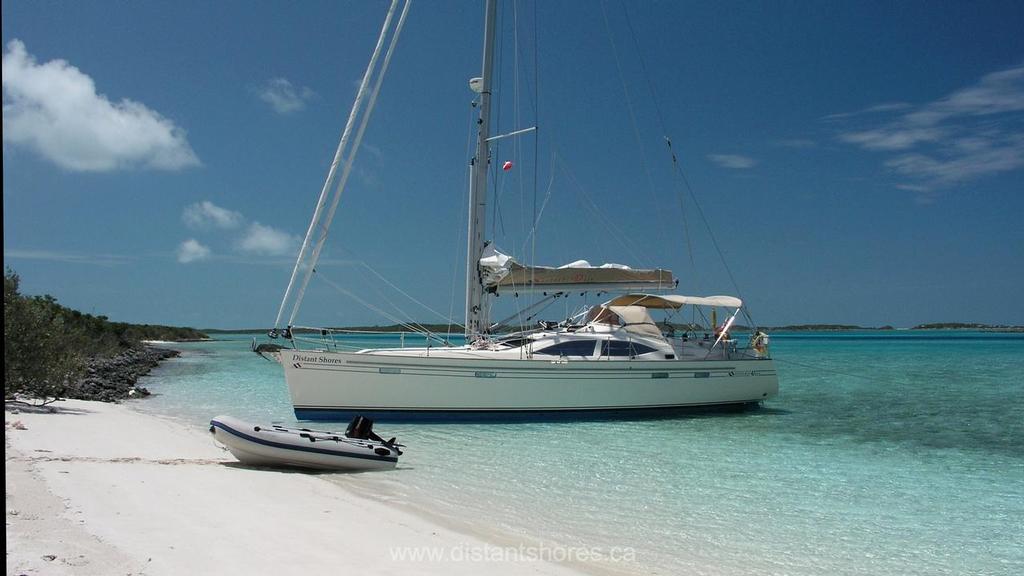 The Shards’ previous boat, Distant Shores, a Southerly 42, dried out in the shallow water of Pipe Creek in the Exumas, Bahamas. © Paul Shard